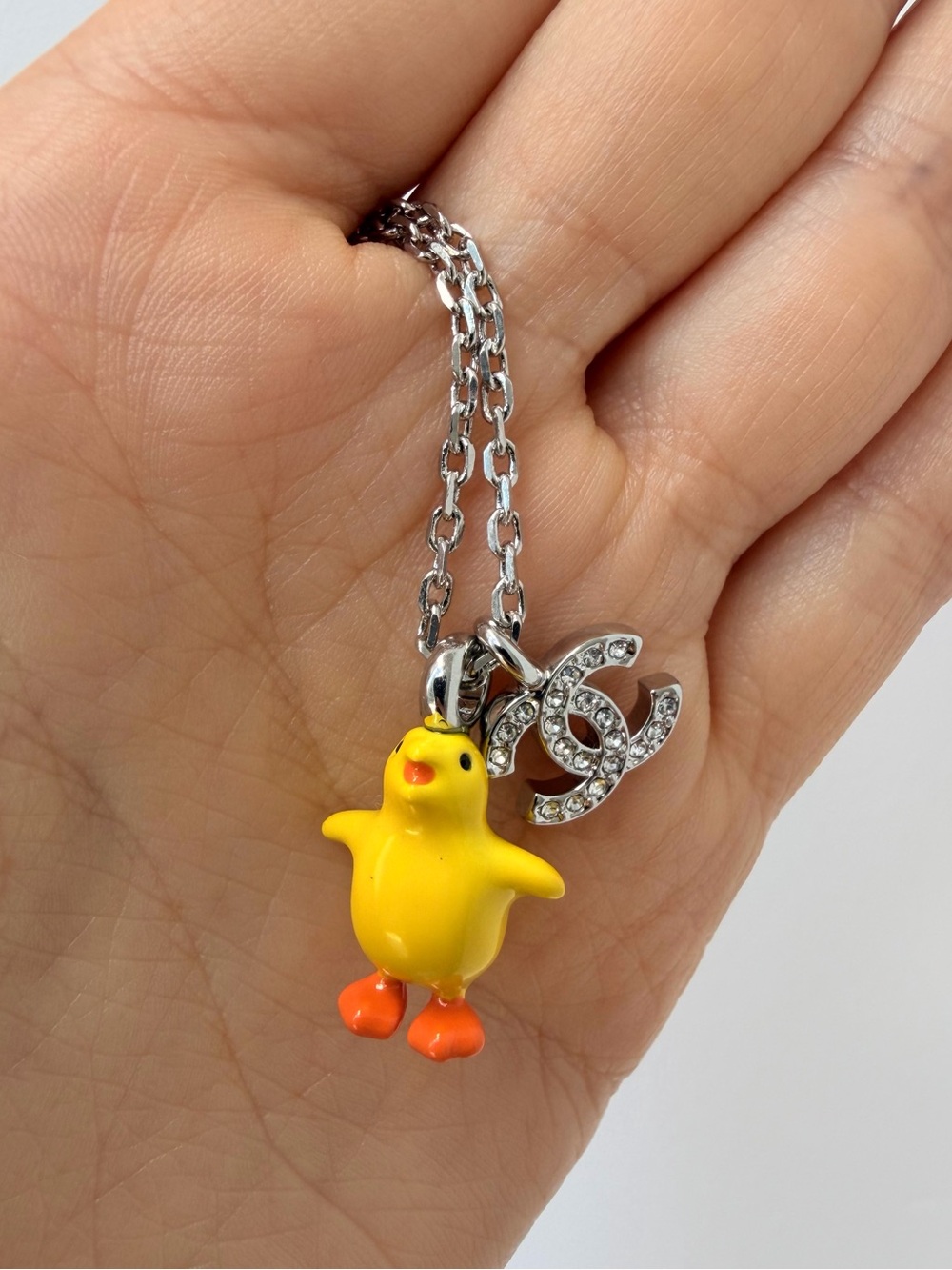 🐥CHANEL Silver Crystal CC Necklace with Yellow and Orange Chick Charm✨